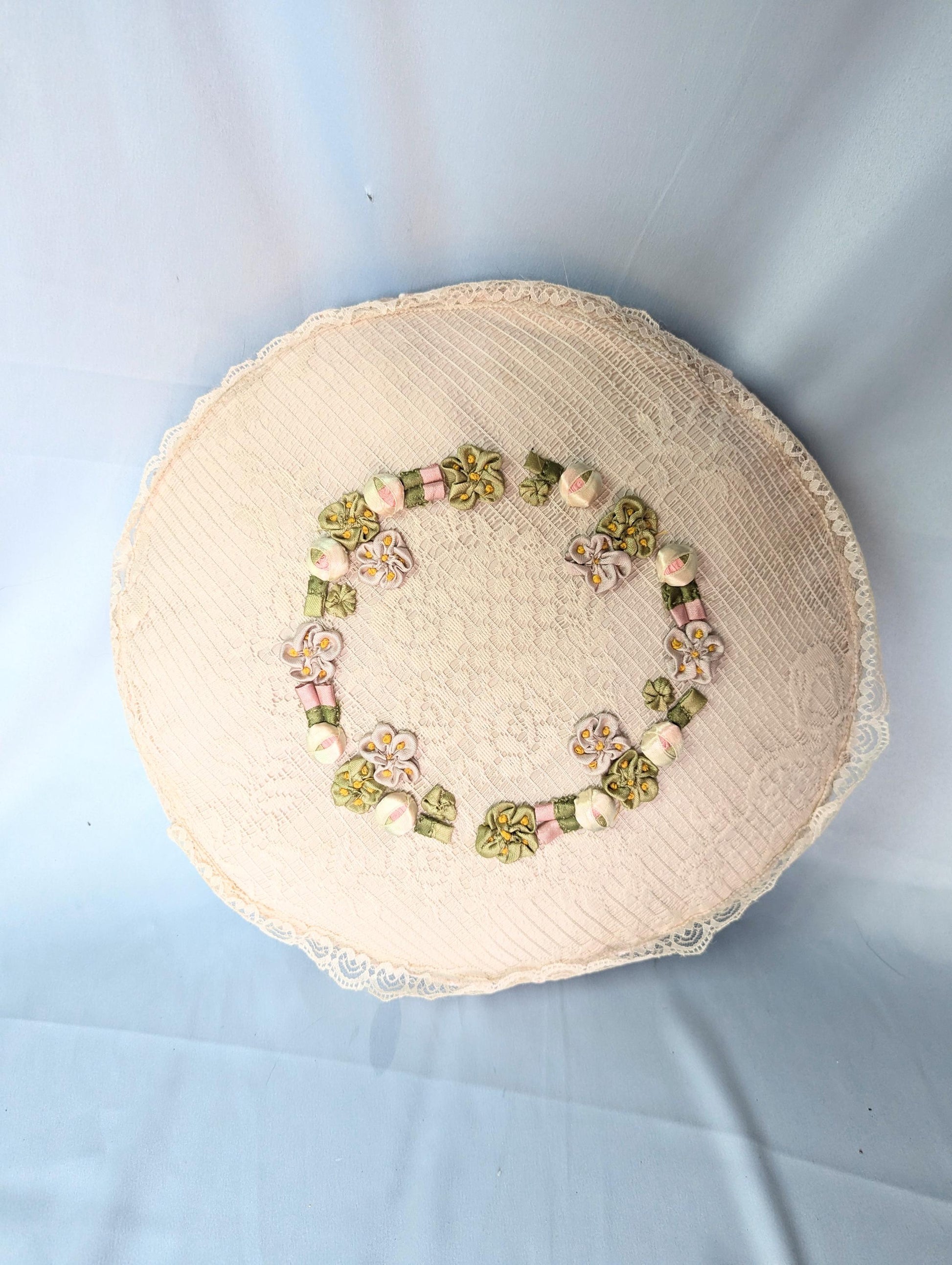 Vintage 80s crochet lace and embroidered rosette round satin pillow