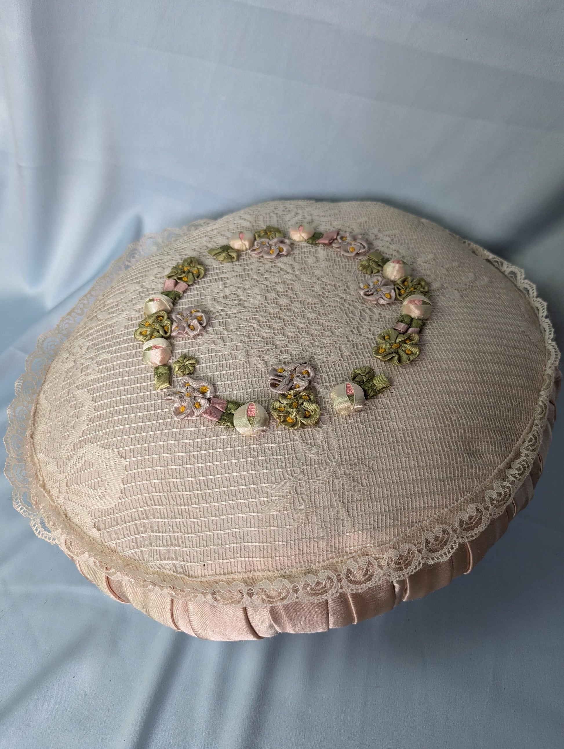 Vintage 80s crochet lace and embroidered rosette round satin pillow