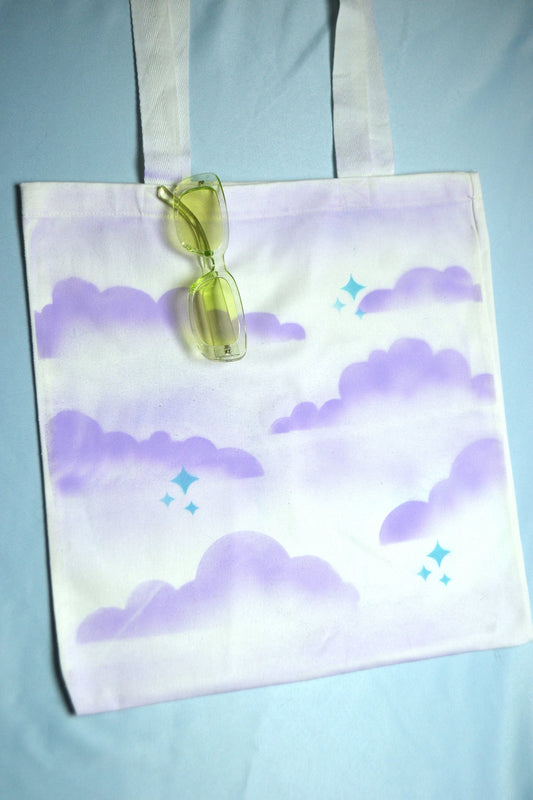 Airbrushed Clouds and Stars purple and blue tote bag